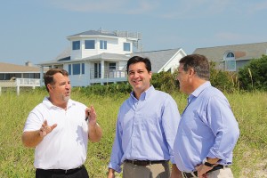 Wrightsville Beach town manager Tim Owens, left, shows North Carolina 7th Congressional District candidate David Rouzer and U.S. Representative Bill Shuster, R-Pennsylvania, Masonboro Inlet and the jetty system Aug. 29.
