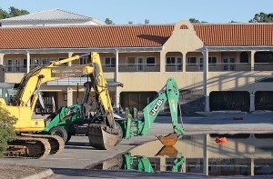 Heavy machinery is staged in the parking lot of the Galleria property at 6800 Wrightsville Avenue to ready for demolition of the old shopping center in November.