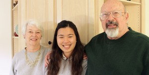 Staff photo by Cole Dittmer. Richard and Marsha Roush stand with Thai exchange student Ratima Jamjod, who the Roushes are hosting for a full school year through International Culture Exchange Services.