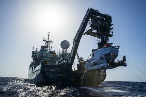 The research vessel Atlantis with the submersible Alvin hanging off its stern.. 