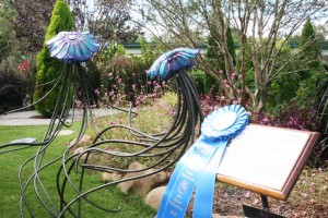 Wilmington artist Matthew Leavell’s The Dance Beneath the Waves win the People's Choice award at the 2015 Art in the Arboretum for the second consecutive year. Staff photo by Terry Lane.