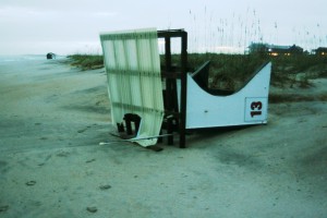 Lifeguard stand no. 13 sits toppled on Sunday, Oct. 4 after high tides and rough seas tore it down on Wrightsville Beach's south end. It's base sits about 100 yards further south. Staff photo by Terry Lane.