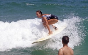Karson Lewis catches a wave on the finless board during her heat.