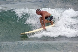 Mike Barden, owner of Surf City Surf Shop, surfs his heat on the finless board.