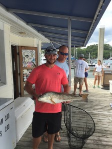 Josh Giffth and Philip Hincher, of Team Stumpjumper, show the winning red drum. Photo courtesy of Fisherman's Post.