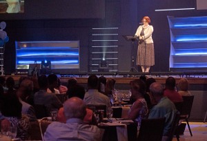 Former Brigade Boys & Girls Club member and 2016 Youth of the Year Caroline Parks speaks at the 9th annual Breakfast at the Kids' Table Aug. 4 at Port City Community Church.