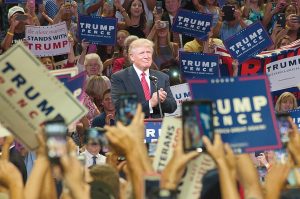 Lumina News file photo. Republican presidential candidate Donald J. Trump takes the stage at the University of North Carolina Wilmington's Trask Coliseum Aug. 9, 2016.